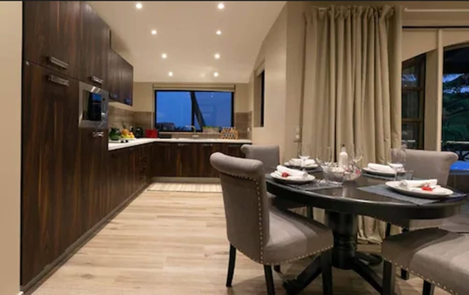 Deluxe Suite, 1 King Bed, Ocean View, Oceanfront | Private kitchen | Fridge, microwave, stovetop, coffee/tea maker