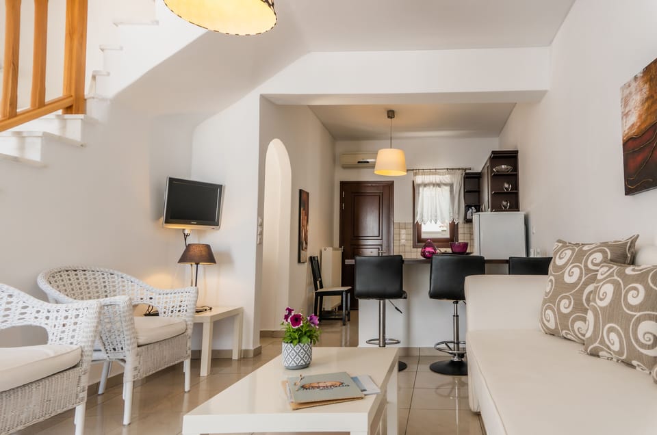 Duplex | Living room | 24-inch Smart TV with cable channels, TV, fireplace