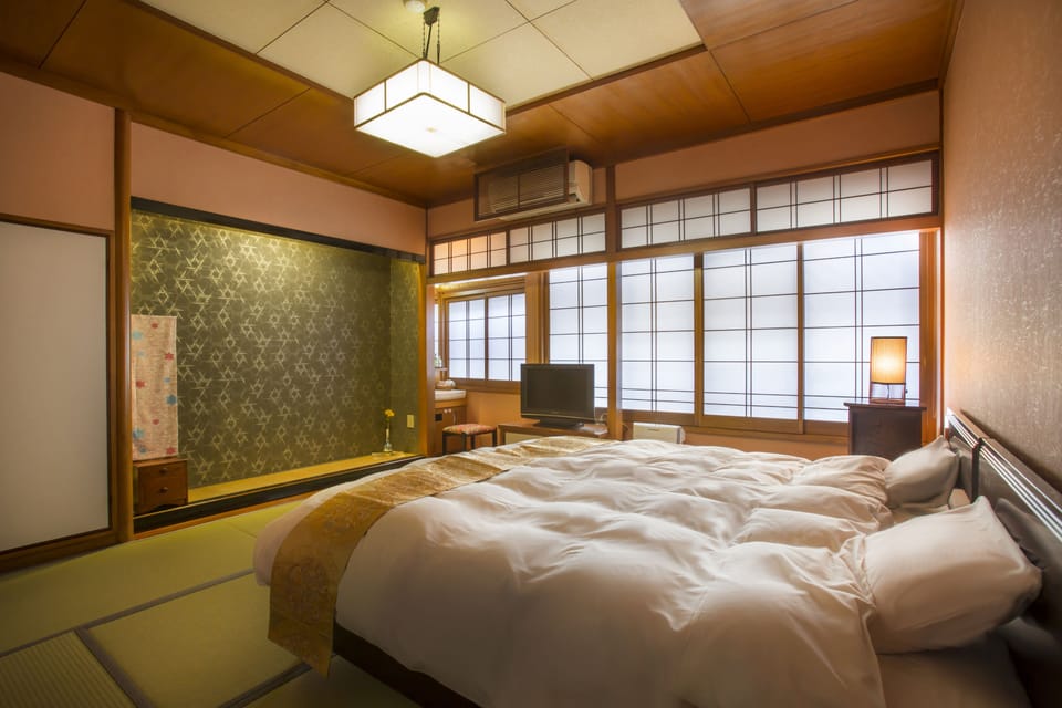 C Type Economy Twin Room (with Private Toilet, Shared Bathroom), Non Smoking | Down comforters, in-room safe, desk, WiFi (free)