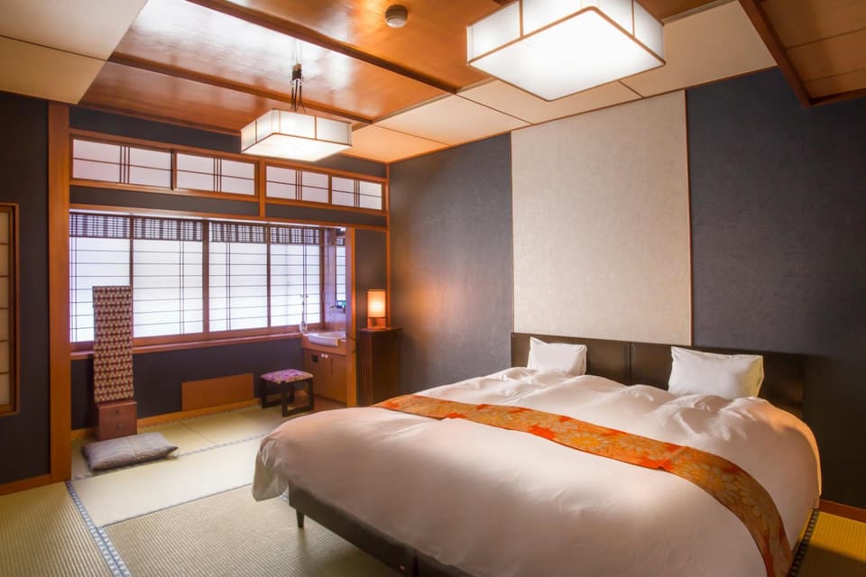C Type Economy Twin Room (with Private Toilet, Shared Bathroom), Non Smoking | Down comforters, in-room safe, desk, WiFi (free)