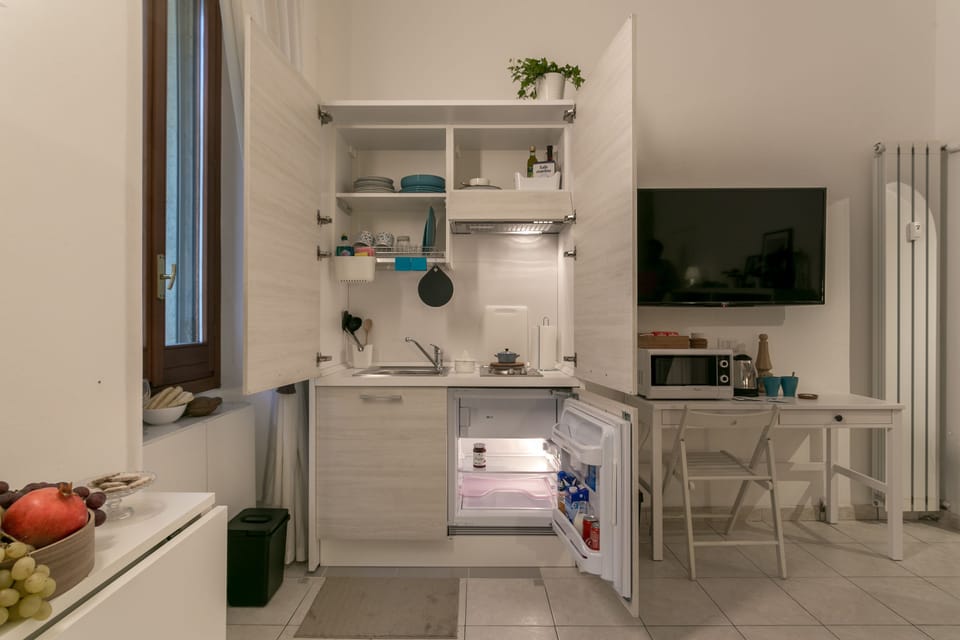 Apartment, 1 Bedroom | Private kitchenette | Fridge, microwave, stovetop, coffee/tea maker