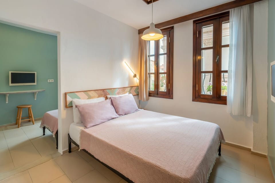 Family Quadruple Room | Desk, iron/ironing board (on request), WiFi (free), bed sheets