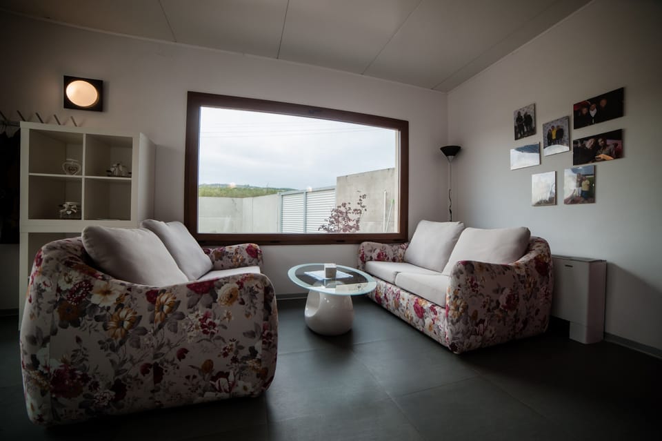 Classic Double Room | Living area | Flat-screen TV