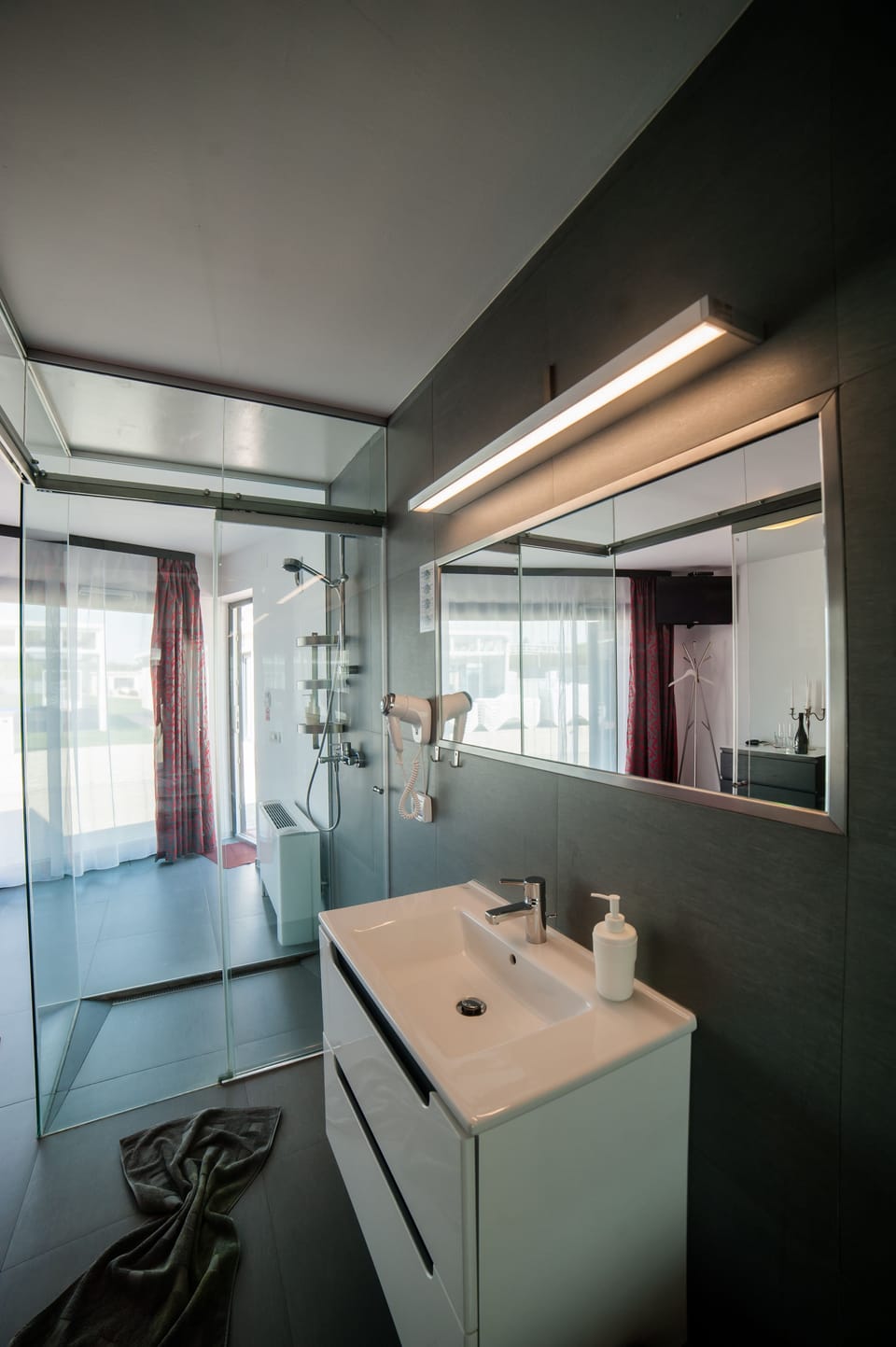 Shower, free toiletries, hair dryer, slippers