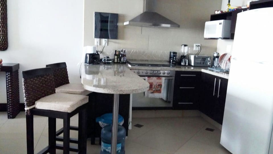Family Condo, 2 Bedrooms, Ocean View, Beachside | Private kitchen | Coffee/tea maker