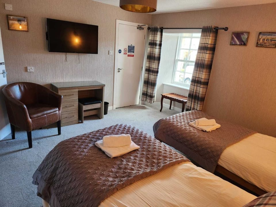 Desk, iron/ironing board (on request), WiFi (free), bed sheets