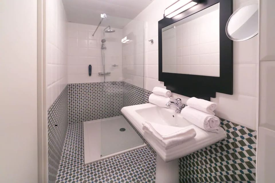 Shower, free toiletries, hair dryer, bathrobes