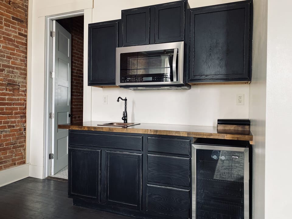 Luxury Studio, 2 Double Beds (206) | Private kitchenette | Mini-fridge, coffee/tea maker, highchair