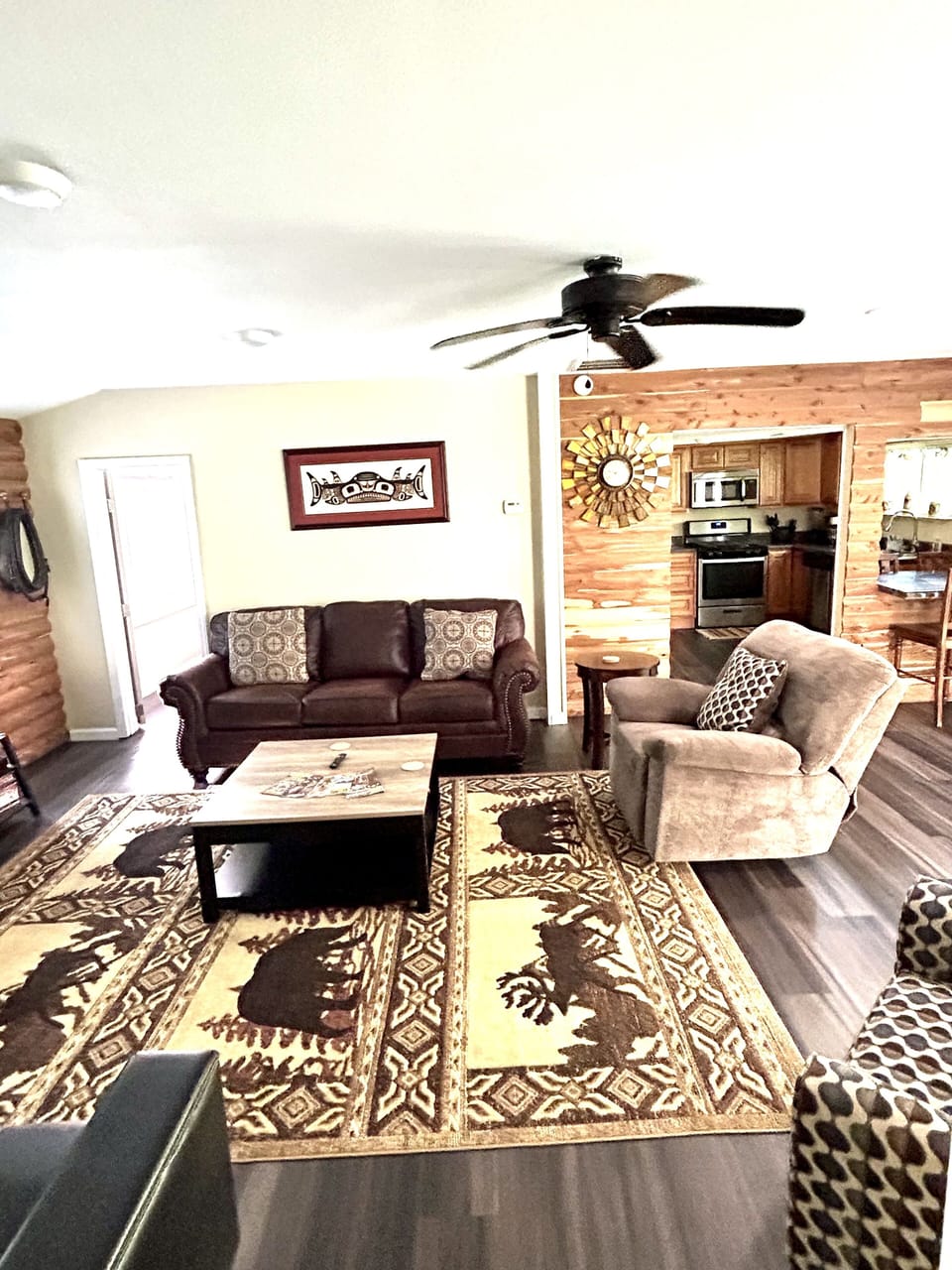 New leather pull out sofa bed, lazy boy arm chair, coffee table and side tables