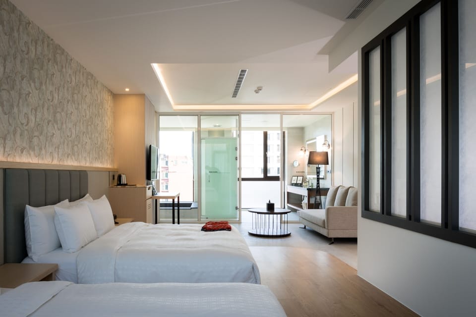 Deluxe Quadruple Room | Premium bedding, desk, blackout drapes, free WiFi