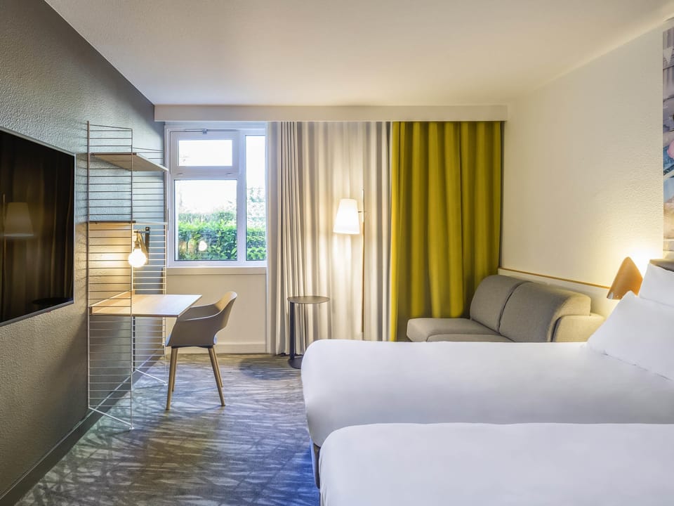Premium bedding, memory foam beds, in-room safe, desk