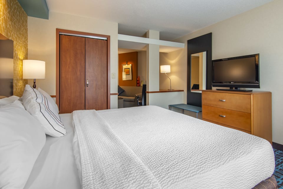 Premium bedding, desk, blackout drapes, iron/ironing board