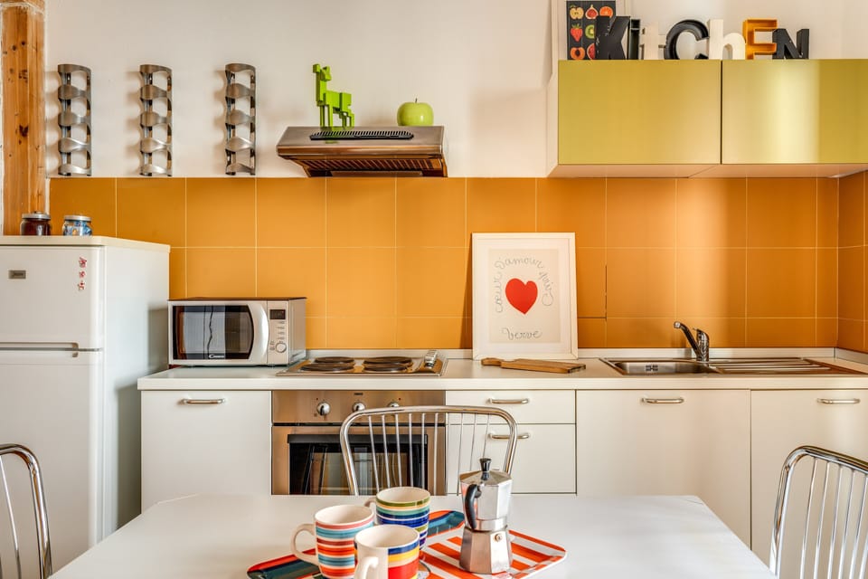 Full-size fridge, microwave, stovetop, electric kettle