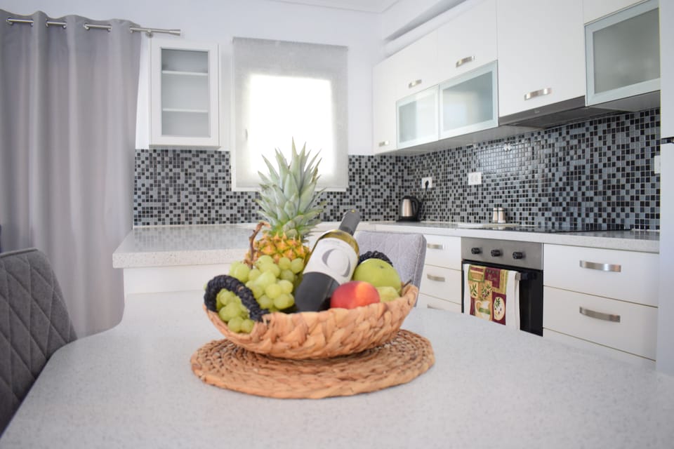Apartment, 2 Bedrooms, Sea View | Private kitchen | Fridge, oven, stovetop, coffee/tea maker