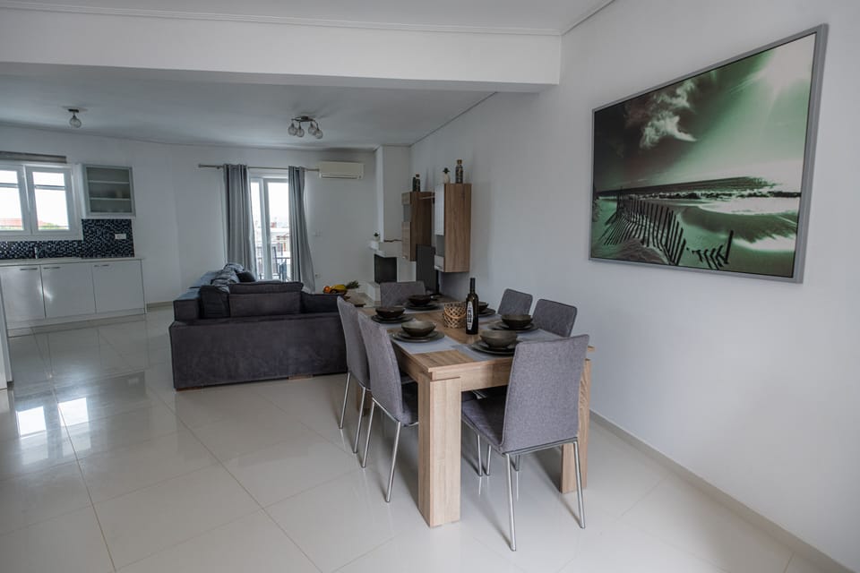 Apartment, 2 Bedrooms, Sea View | Living area | Flat-screen TV, fireplace