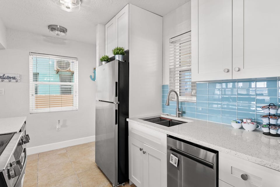 Fully equipped kitchen with a Nespresso, Keurig, drawer microwave, & dishwasher