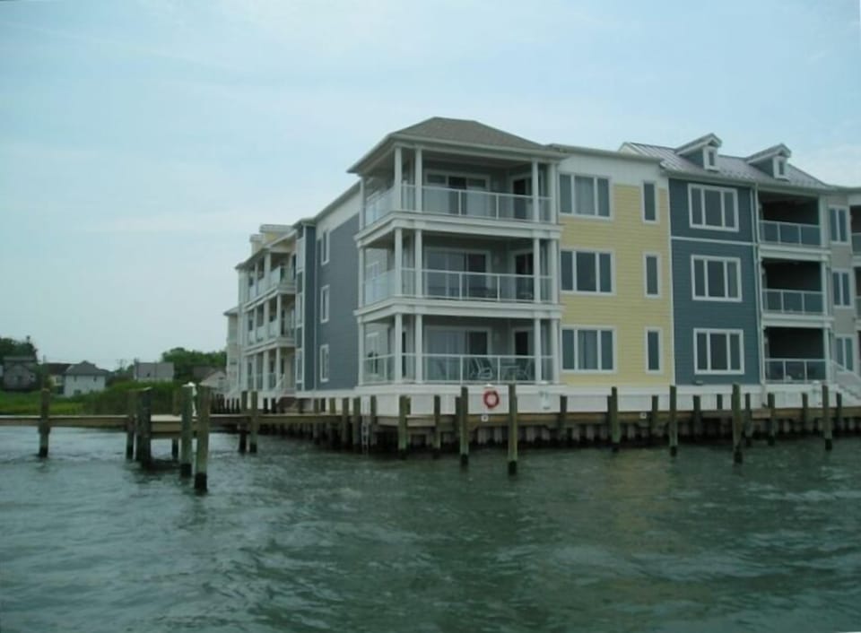 Corner/End Unit Yellow siding location of Master Bedroom-and corner living area