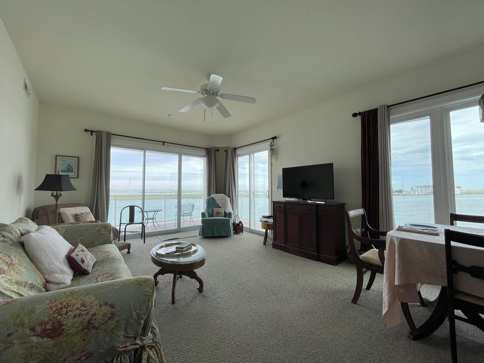 Living room and dining room with fantastic water views.
