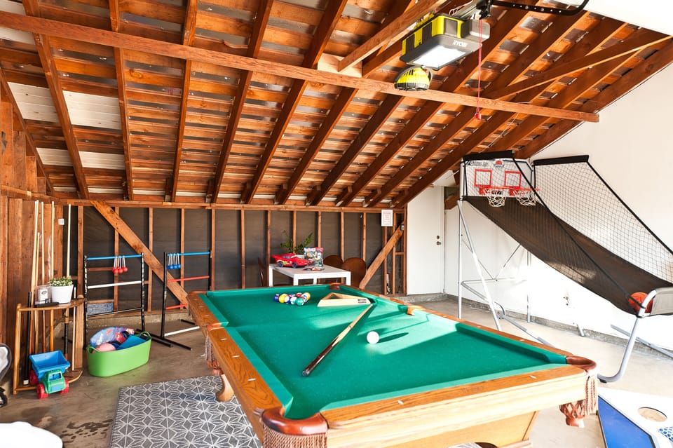 Game room with billiards, basketball, ladder toss and more!
