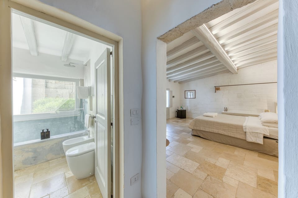 Deluxe Suite, 1 Bedroom, Patio, Garden Area | Premium bedding, Select Comfort beds, minibar, individually decorated