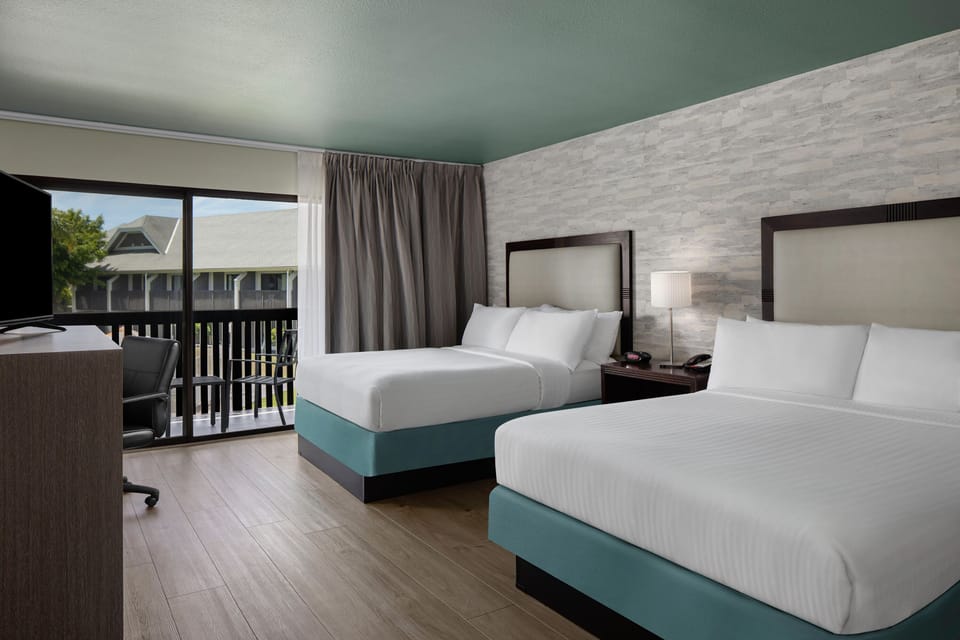 Premium Room, 2 Queen Beds, Balcony, Pool View | Hypo-allergenic bedding, in-room safe, desk, laptop workspace
