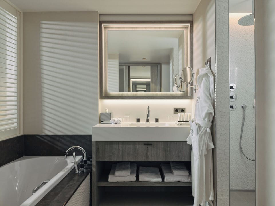 Standard Room, 1 King Bed, City View | Bathroom | Separate tub and shower, free toiletries, hair dryer, bathrobes