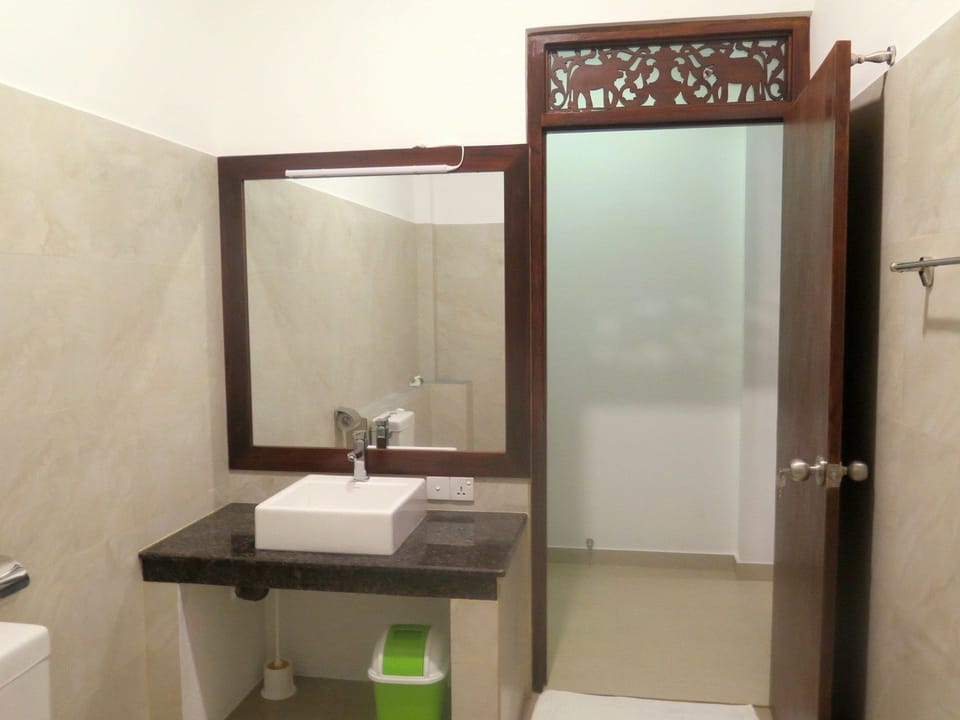 Shower, free toiletries, hair dryer, slippers