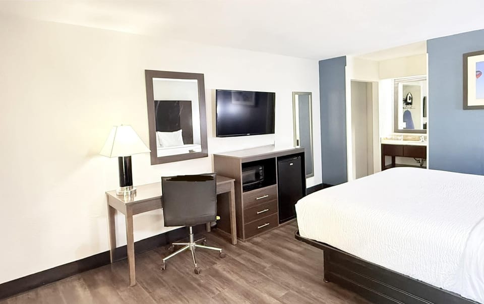 Desk, blackout drapes, iron/ironing board, free WiFi