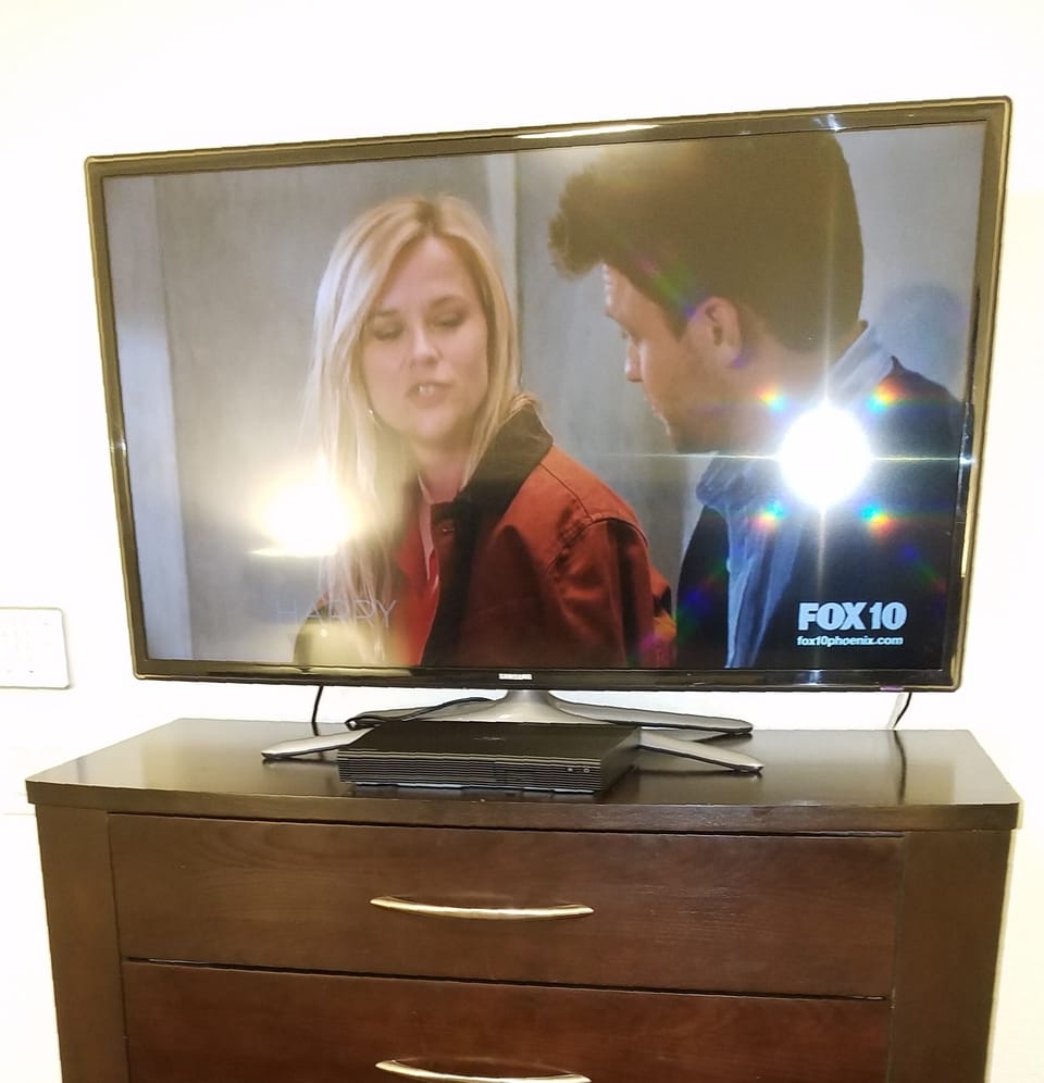 Master bedroom 42" inch Samsung Smart TV and DVD player 