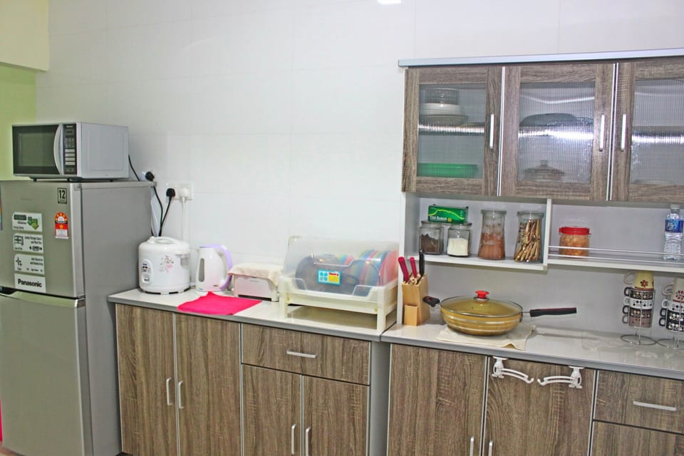 Family Condo | Private kitchen | Full-size fridge, microwave, oven, stovetop