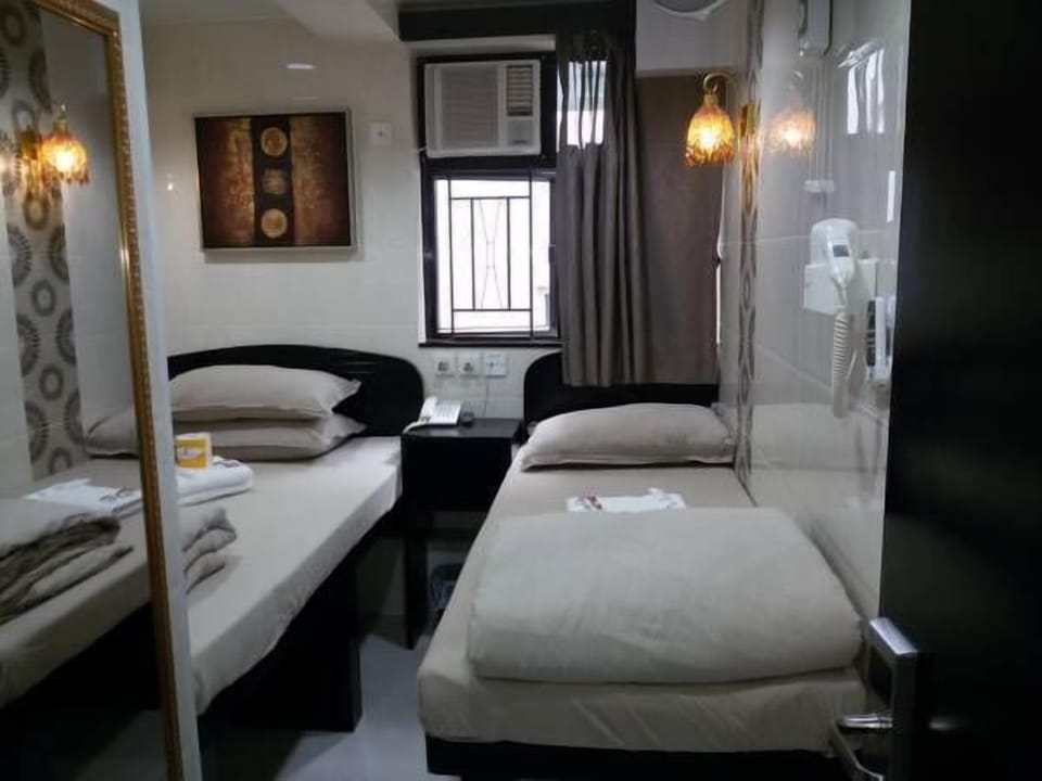 Triple Room, Private Bathroom | Iron/ironing board, free WiFi, bed sheets
