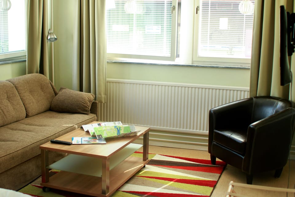 Apartment, 2 Bedrooms | Living area | Flat-screen TV