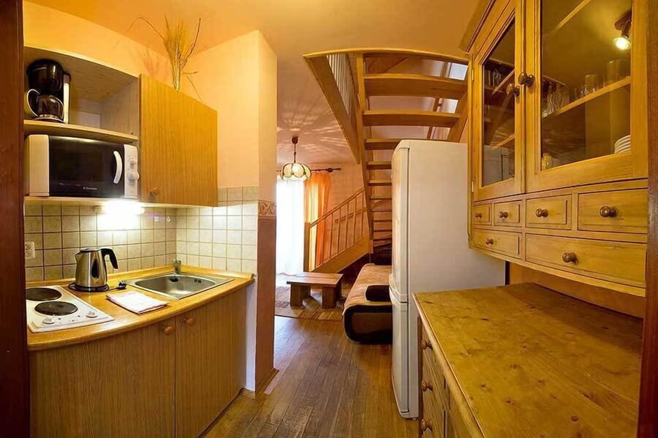 Comfort Apartment | Private kitchen | Full-size fridge, microwave, stovetop, coffee/tea maker