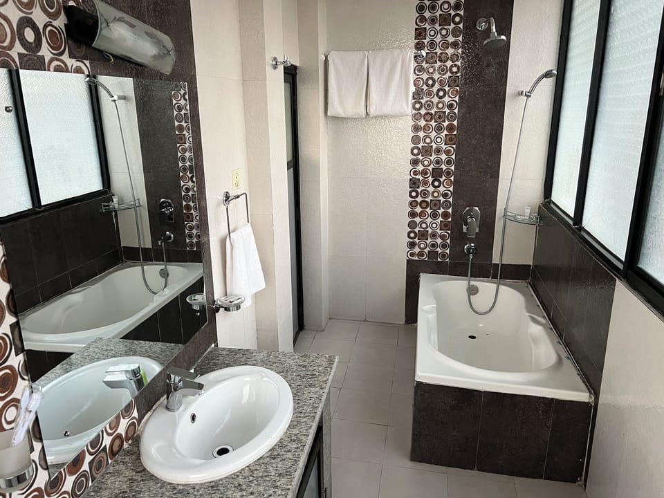 Superior Room | Bathroom | Free toiletries, slippers, towels, soap