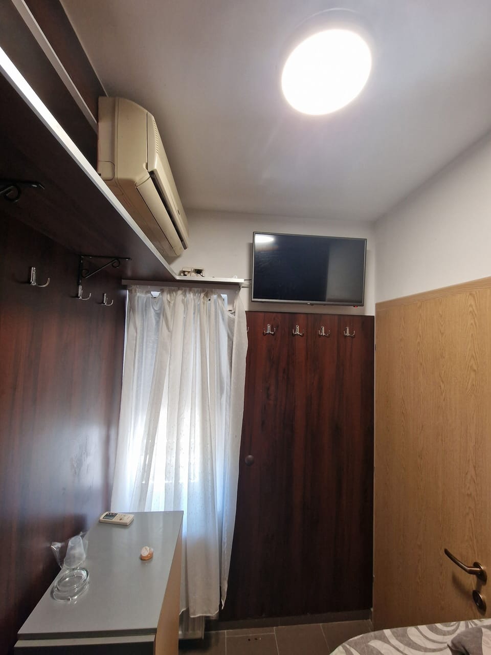 Economy Room | Blackout drapes, free WiFi, bed sheets