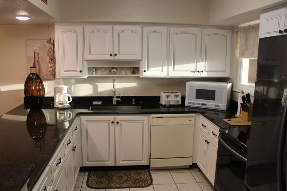 Fully Stocked Kitchen with Granite Countertops