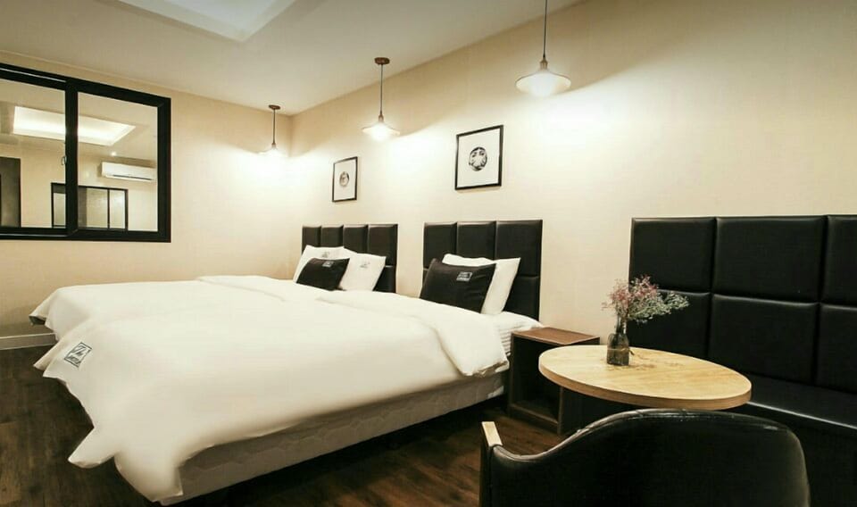 Twin Room (A) | Premium bedding, down comforters, Tempur-Pedic beds, free rollaway beds