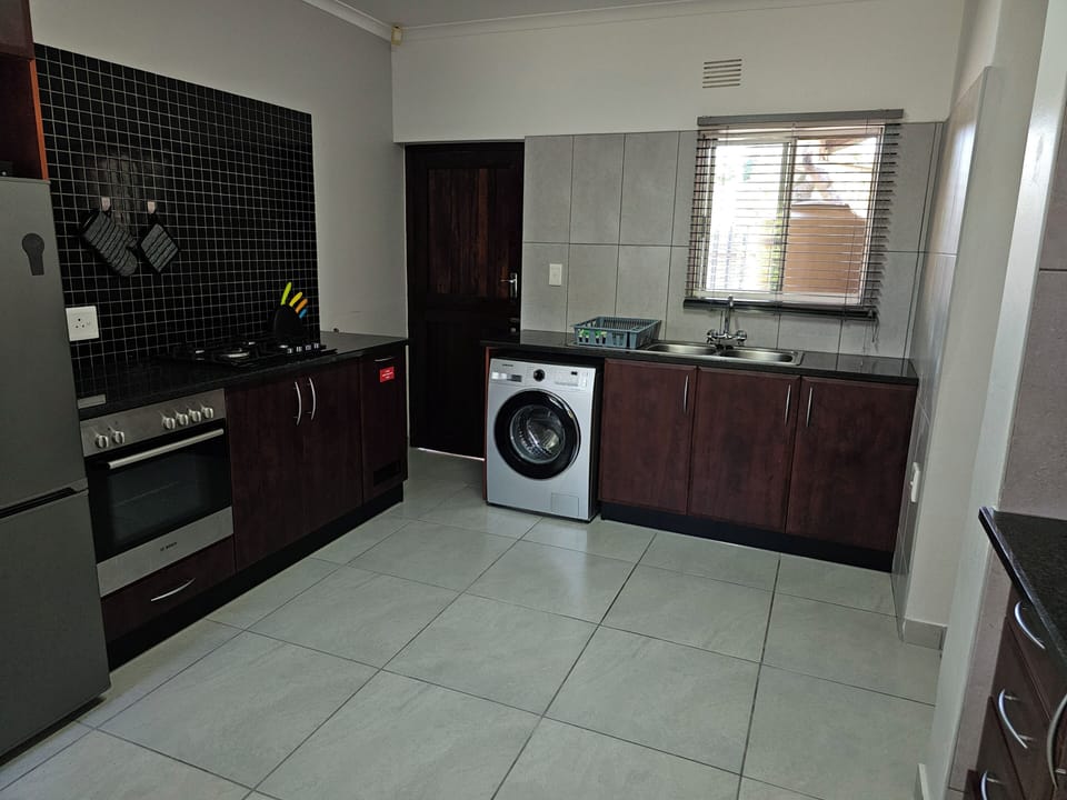 Standard Townhome, 2 Bedrooms | Private kitchen | Full-size fridge, microwave, oven, stovetop