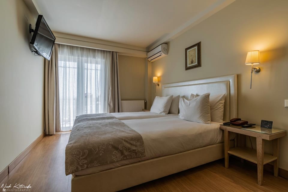 Egyptian cotton sheets, down comforters, in-room safe, desk