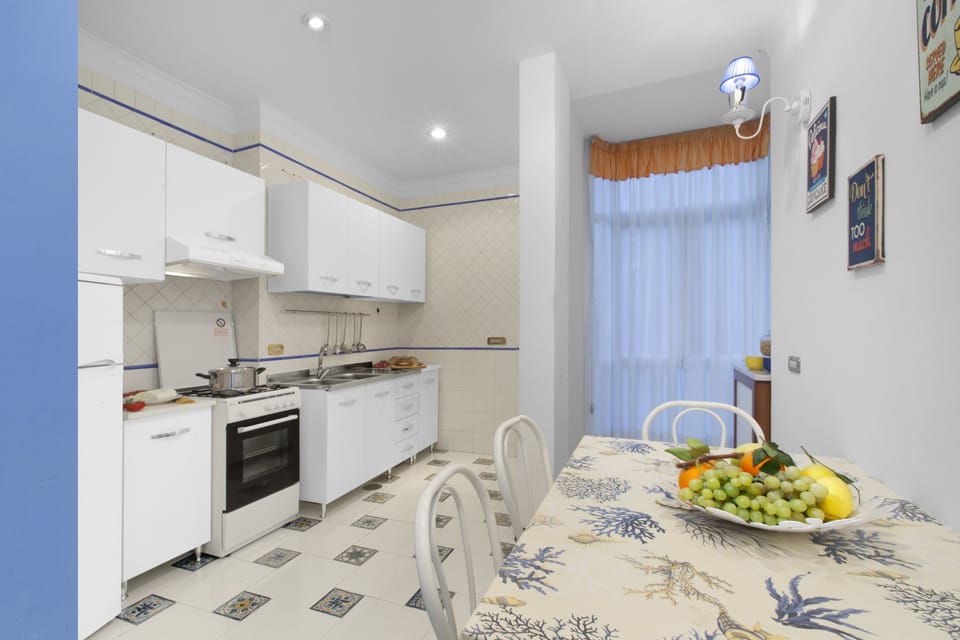 Apartment, 2 Bedrooms | Private kitchen | Fridge, microwave, stovetop, coffee/tea maker