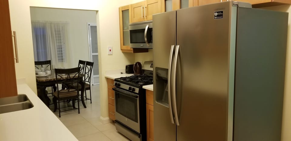 Exclusive Villa, 3 Bedrooms, 2 Bathrooms, Partial Ocean View | Private kitchen | Coffee/tea maker, full-size fridge, microwave, oven