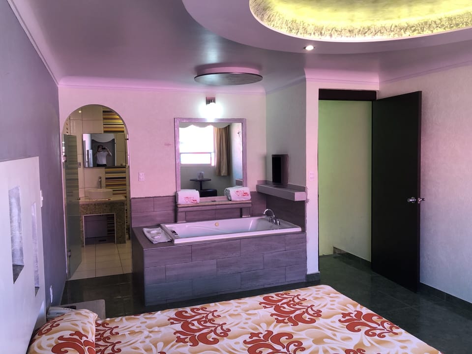 Exclusive Room, Jetted Tub | Individually decorated, individually furnished, laptop workspace
