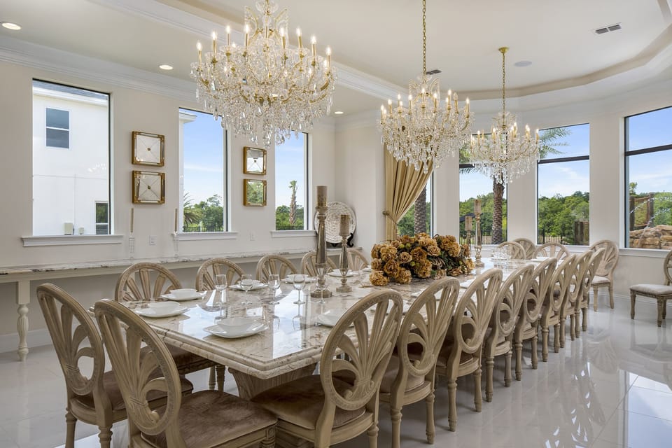 The luxurious dining space has seating space for 24
