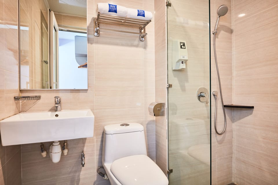 Shower, free toiletries, hair dryer, towels
