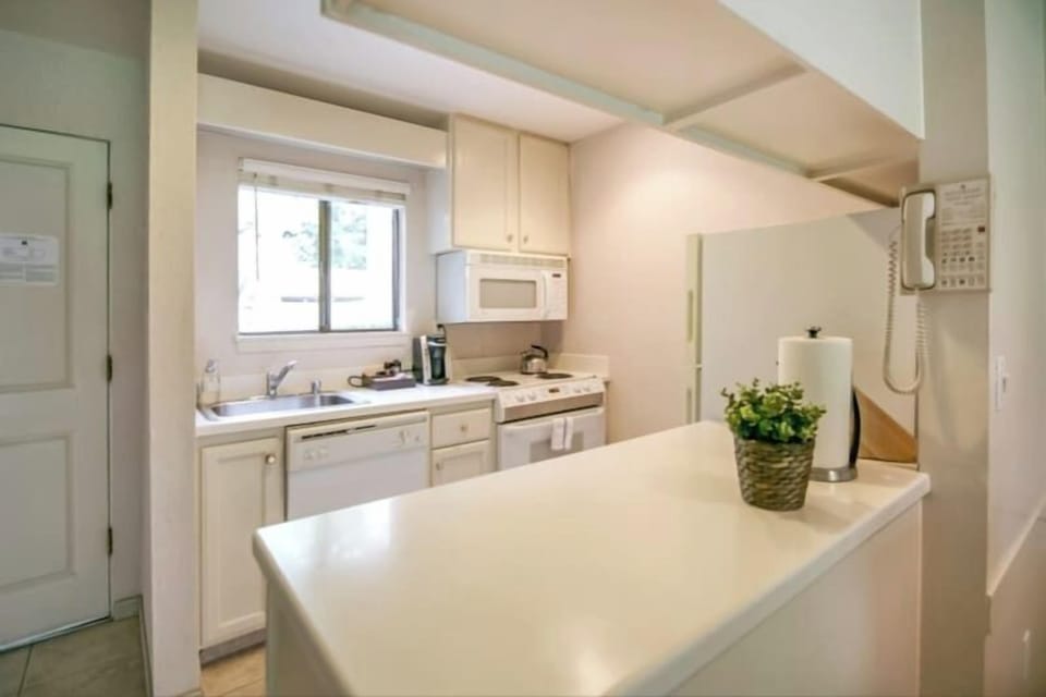 Elevate your stay with the comforts of home, including a fully equipped kitchen ready to inspire your culinary creativity and satisfy your cravings.