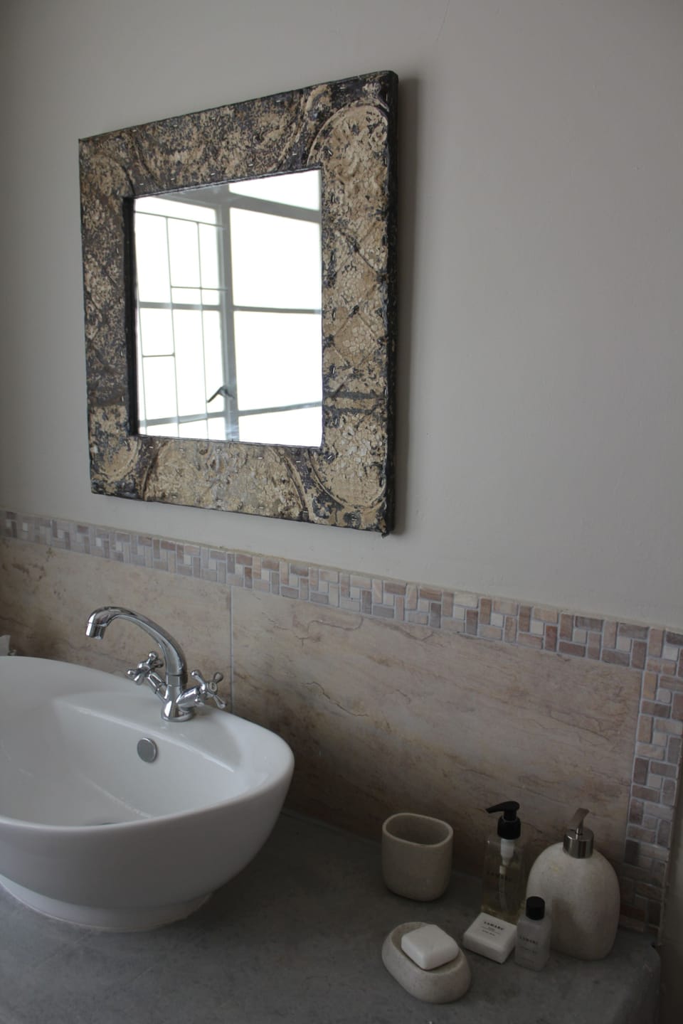 Designer toiletries, hair dryer, bathrobes, slippers
