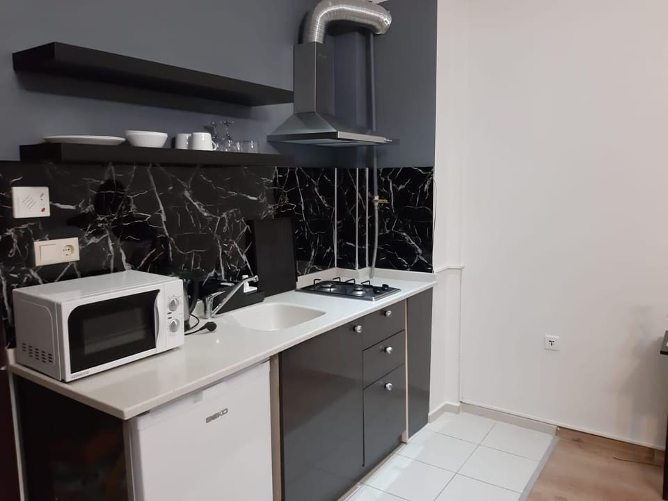 Mini-fridge, microwave, stovetop, electric kettle