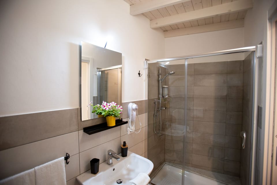 Superior Double Room, Multiple Beds, Balcony | Bathroom | Shower, rainfall showerhead, hair dryer, bidet