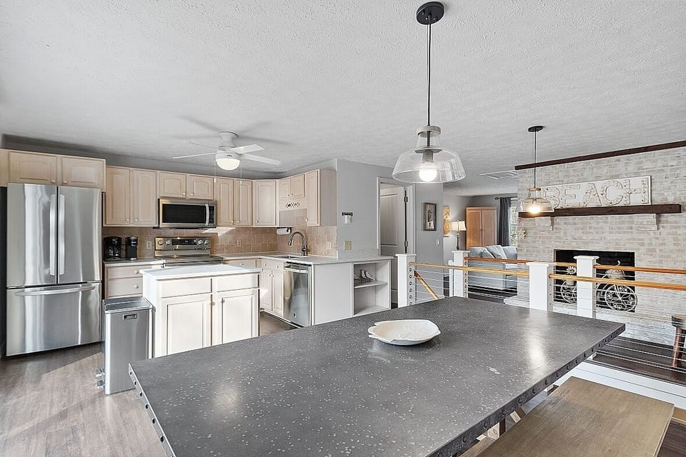 Open spaced kitchen so you don't miss out while preparing a meal