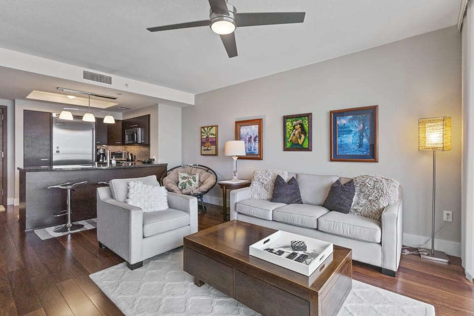 Living Room - Open floor plan living area offers a sofa with seating and flat-screen tv for your enjoyment and relaxation.